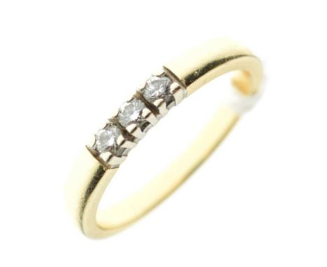 Three-stone diamond ring, stamped '585', size M½, 3g gross approx