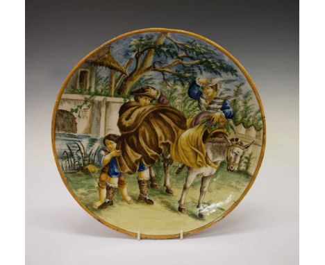 Late 19th Century Italian maiolica shallow dish, possibly Castelli, decorated with a family of three figures outside a cottag