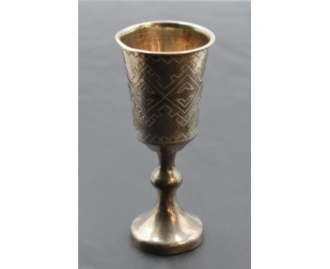 Two 19th century Russian white metal Kiddush cups, with marks for Moscow 1884 and 1886, each marked '84' and having engraved 