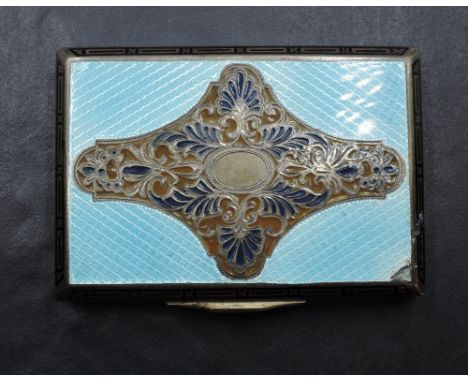 A continental 900 grade white metal and guilloche enamel box, of hinged rectangular form, the engine turned cover with pierce
