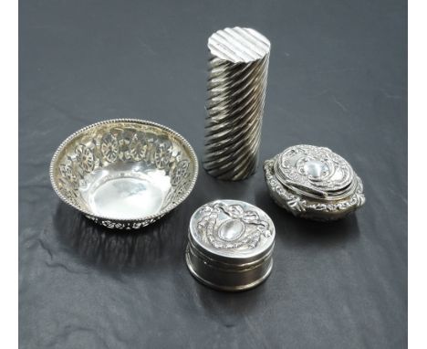 Four pieces of HM silver including a small trinket dishes, two lidded trinket boxes and a cylindrical container with loose bo