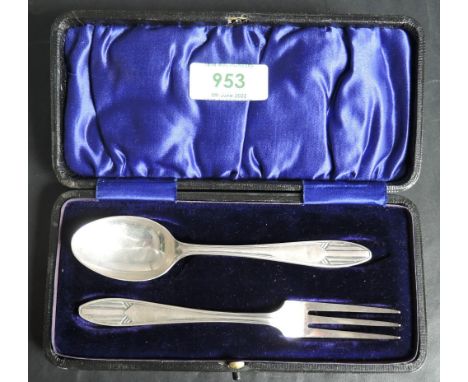 A cased silver christening set, comprising spoon and fork, marks for Sheffield 1943, maker Thomas Bradbury &amp; Sons, plush 