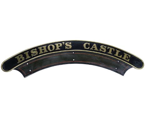A steam engine locomotive nameplate 'Bishop's Castle' with cabside numberplate '5064', cast in brass and painted black with r