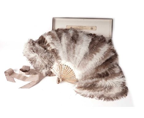 A Belle Epoque ostrich feather fan retailed by Duvelleroy (by appointment only) Regent Street, London, having mother-of-pearl