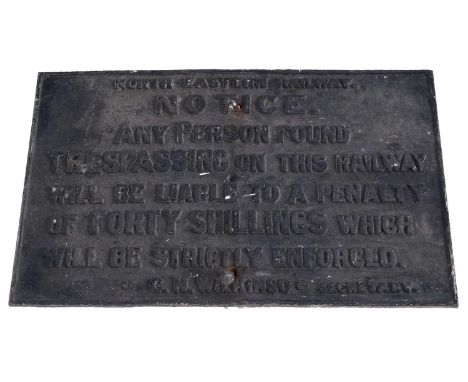 A North Eastern Railway cast iron trespassing notice, “Any person found trespassing on this railway will be liable to a penal