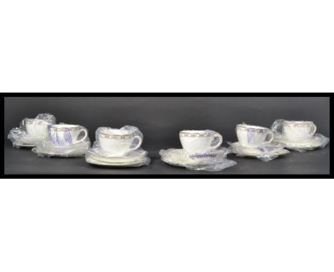 A Wedgwood bone China six person cover tea service in the Colchester pattern, consisting of six trio's with each piece retain