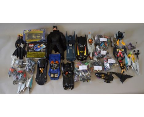 Large quantity of assorted Batman figures, vehicles and related merchandise including Johnny Lightning Batmobiles and boxed M