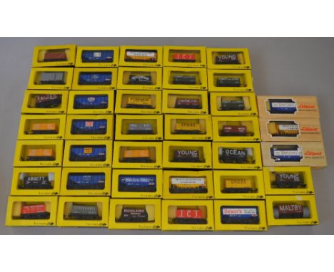 OO Gauge. Trix Trains/Lilliput  40 x boxed rolling stock. Includes private owner wagons & hopper wagons. VG in G boxes.
