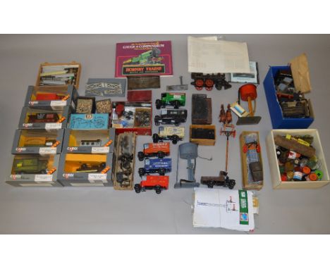 O Gauge. mixed lot. Includes a quantity of spare parts, wheels etc. Accessories & 1:43 scale diecast vehicles.