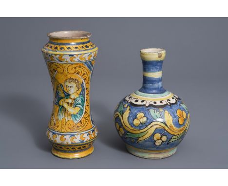 An Italian maiolica pharmacy bottle and an albarello dated 1667, Caltagirone, 17th C.--H 27,3 - 23,5 cm -- Please request con