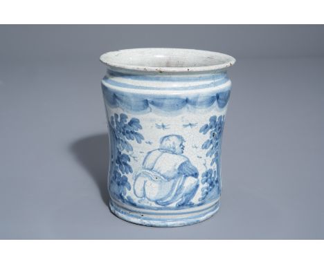 A blue and white albarello with a man taking a poo, Italy, dated 1726--H 14,5 cm -- Please request condition reports by e-mai