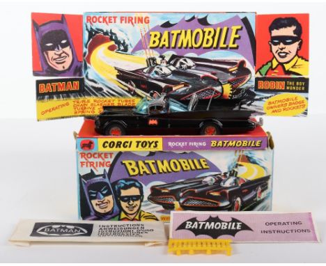 Corgi Toys 267 Rocket Firing Batmobile, cast towing hook, gloss black body, red bat hubs, blue tinted windscreens, with "Batm