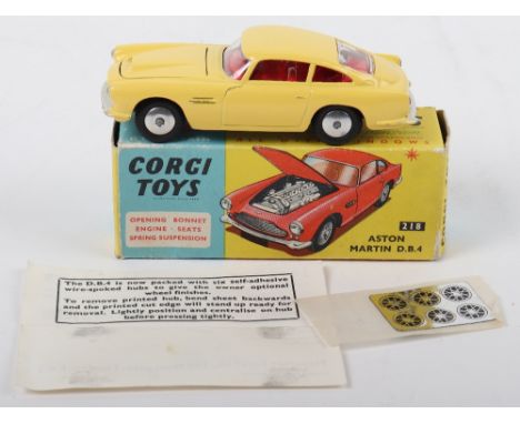 Corgi Toys 218 Aston Martin D.B.4, primrose yellow body, red interior, flat spun wheel hubs, in near mint original condition,