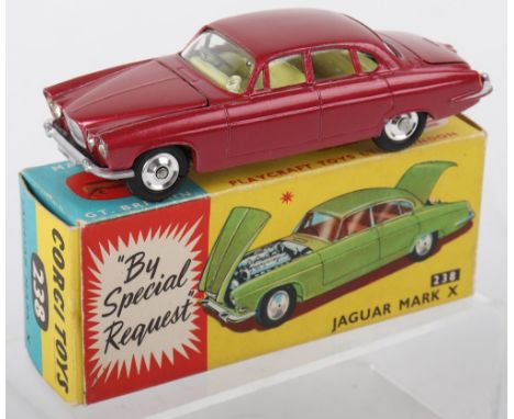 Corgi Toys 238 Jaguar Mark X, metallic cerise body, yellow interior, shaped spun wheel hubs, in very good to excellent origin