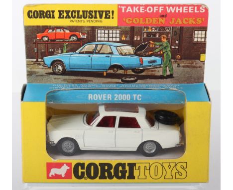 Corgi Toys 275 Rover 2000TC ‘Golden Jacks’ take off wheels, Scarce white body, maroon interior, in near mint original conditi