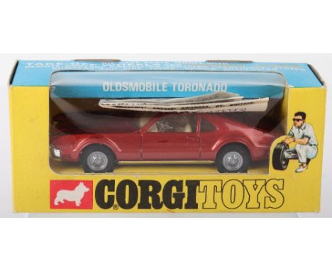 Corgi Toys 276 Oldsmobile Tornado ‘Golden Jacks’ take off wheels, metallic brown body, cream interior, in mint original condi