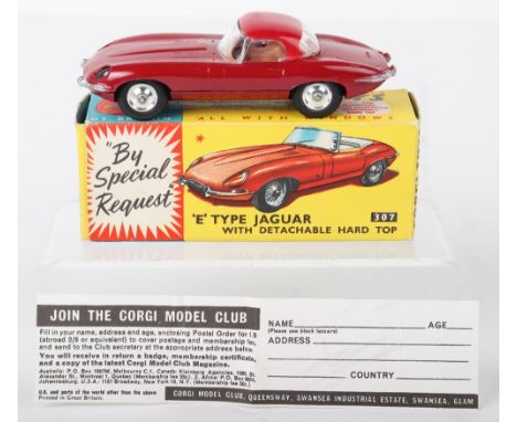 Corgi Toys 307 ‘E’ Type Jaguar, with detachable hard top, plum red body, red hard top, tan interior, spun shaped wheels, in m