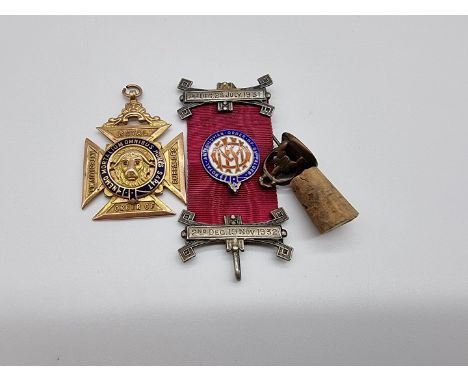 A 9ct gold and enamel Royal Antediluvian Order of Buffaloes medal,&nbsp;Chester 1937, gross weight 18.8 g; together with a Gr