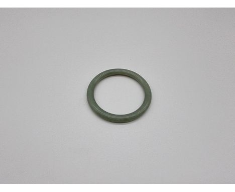 A jadeite circular bangle, 87mm diameter. 