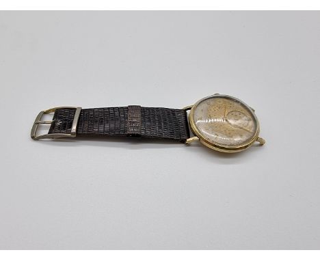 A 1940s Movado yellow metal manual wind wristwatch,&nbsp;33mm, stamped 14k, No 85496-42786. 