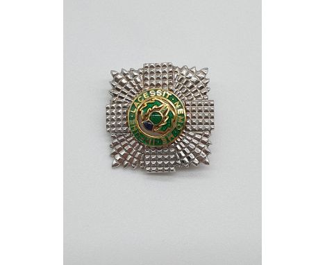 (NB) A Scots Guards enamel, 9ct white and yellow gold badge, by J W B, Birmingham 1988, 22.5mm, gross weight 8g.