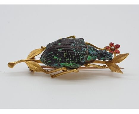 (NB) A 19th century yellow metal and enamel novelty beetle brooch,&nbsp;45mm wide, gross weight 5g.