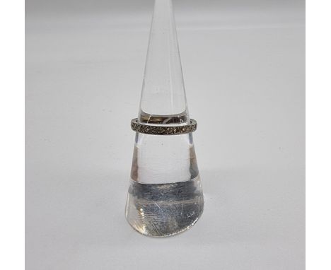 A white metal diamond solitaire ring, size K, gross weight 2.3g. 