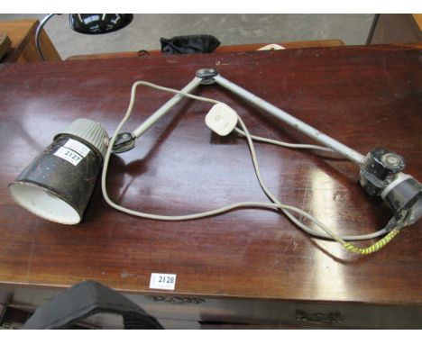 A 1950's engineers desk lamp with geared joints, black and white enamel shade 