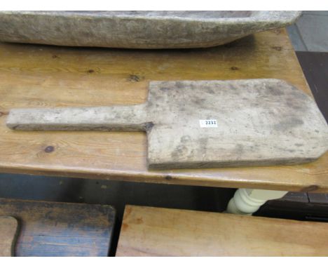 A rustic hardwood bread board