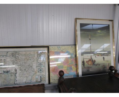 A print of a boat and two framed map prints