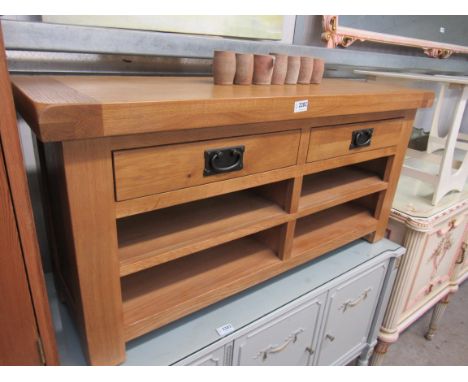 A light oak two drawer T.V stand      