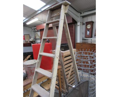A 1940's part painted pine eight rung decorators folding step ladder