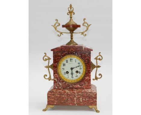 French striking mantel clock in rouge marble case with gilt decoration 