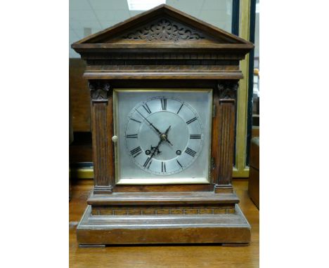 Edwardian striking bracket clock in oak case 