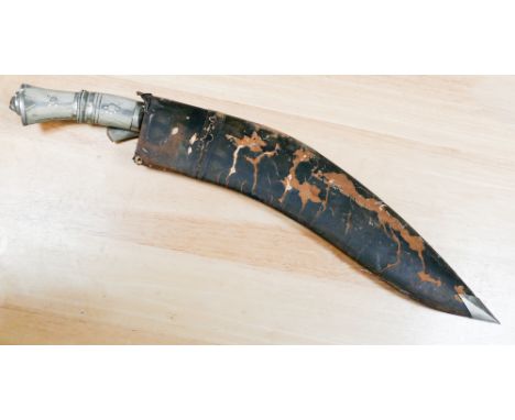 Large kukri with skinning knifes in scabbard   blade in good condition for age