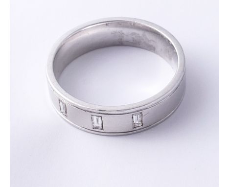 Gents platinum wedding band, set with three baton cut diamonds, ring W/X, size 15 grams.