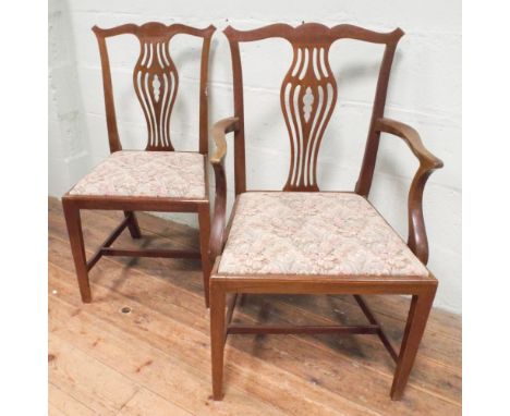 Set of 8 Chippendale style reproduction mahogany dining chairs comprising of 6 standards and 2 carvers with tapestry upholste