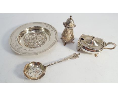 Small hallmarked silver presentation dish, condiments and a sifting spoon.  Gross weight of lot excluding glass liner 7oz tro