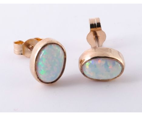 Pair of oval 9ct gold opal ear studs