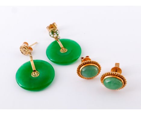 Two pairs of Chinese jade earrings, set in 18k yellow gold, one a pair of studs the other set with disc drops