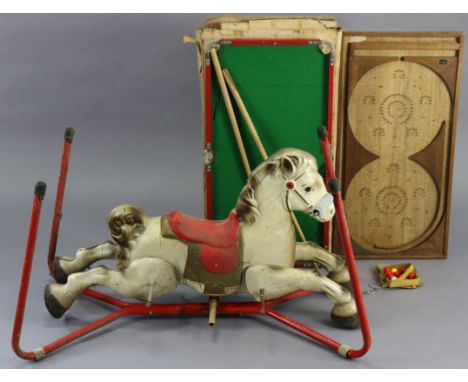 A vintage Mobo “Prairie King” lithographed tin plate rocking horse, 39” wide; together with a Milbro “Loopatelle” bagatelle b