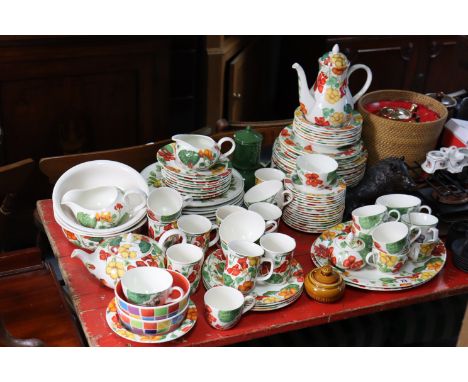 Approximately fifty items of Poole pottery “Nasturtium” dinner, tea, &amp; coffee ware, &amp; various other items of decorati