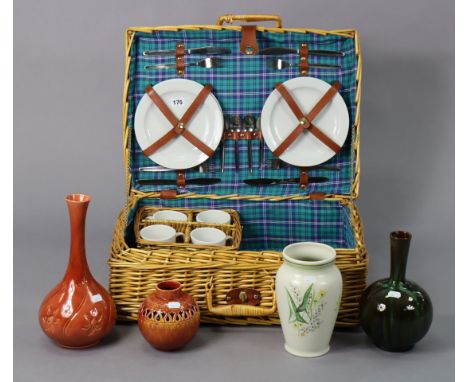A wicker hamper with contents, &amp; four various pottery vases.