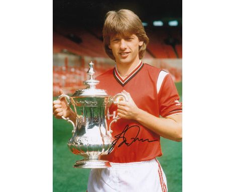Autographed JESPER OLSEN 12 x 8 photo : Col, depicting a superb image showing Manchester United winger JESPER OLSEN posing wi