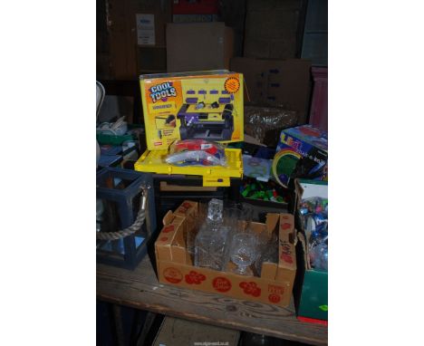 A Playskool child's work desk and box of mixed glass ware including a garden lantern.