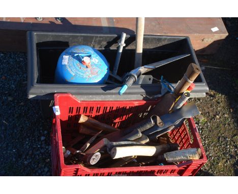 A small pick axe, spade blade, hackers, mower blades, etc.