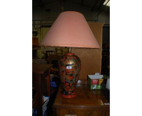 A table lamp and shade.