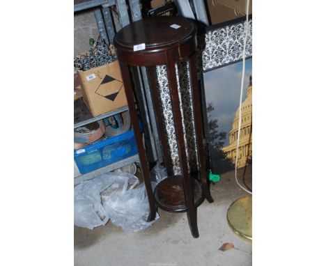 A tall wooden plant stand, 37" high, with lower shelf.