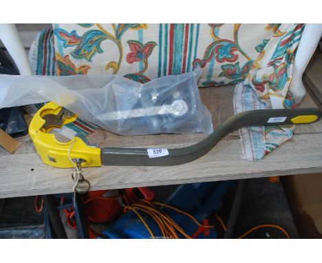 Galvanised gate hinges and a car steering lock.