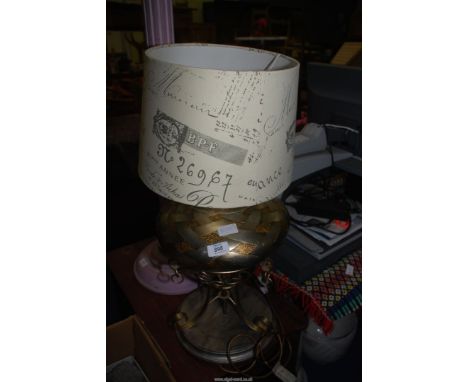 A metal based lamp and shade.